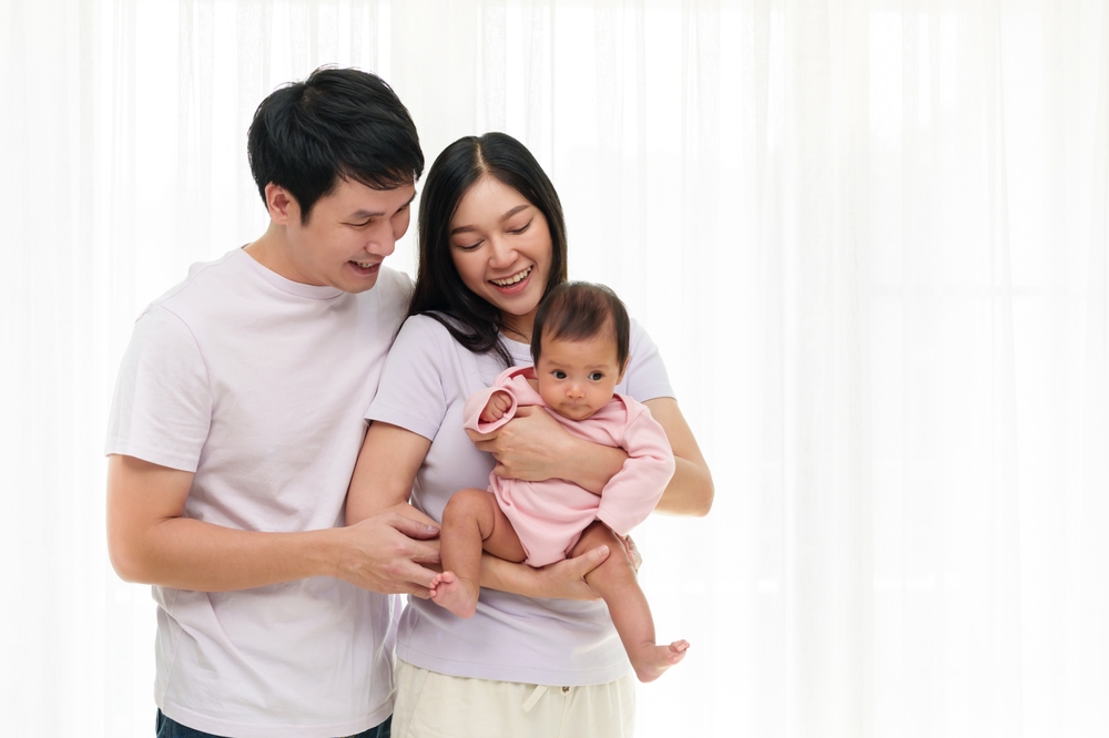 a couple with a baby