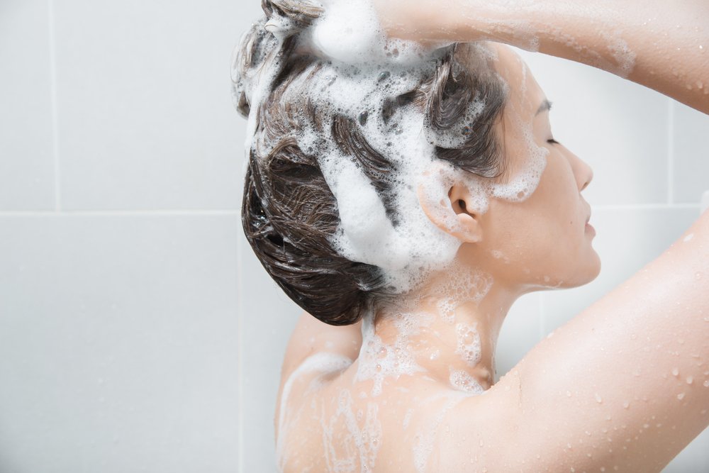 Woman In Shower Washing Hair