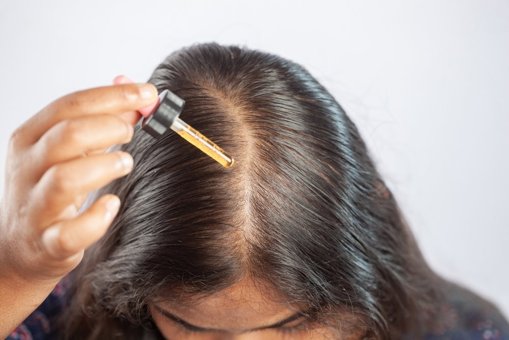 putting essential oils on hair