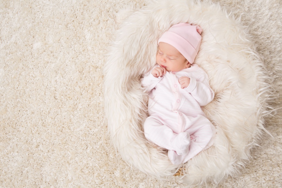 baby with a hat during cold weather