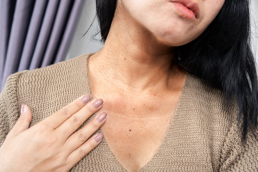 Closeup,Woman,Having,A,Problem,With,Neck,Wrinkles,,Dark,Skin,