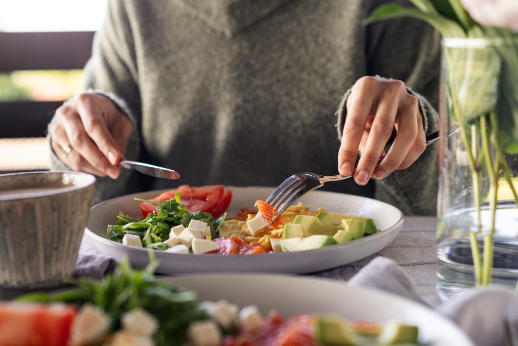 woman eating nutritious food